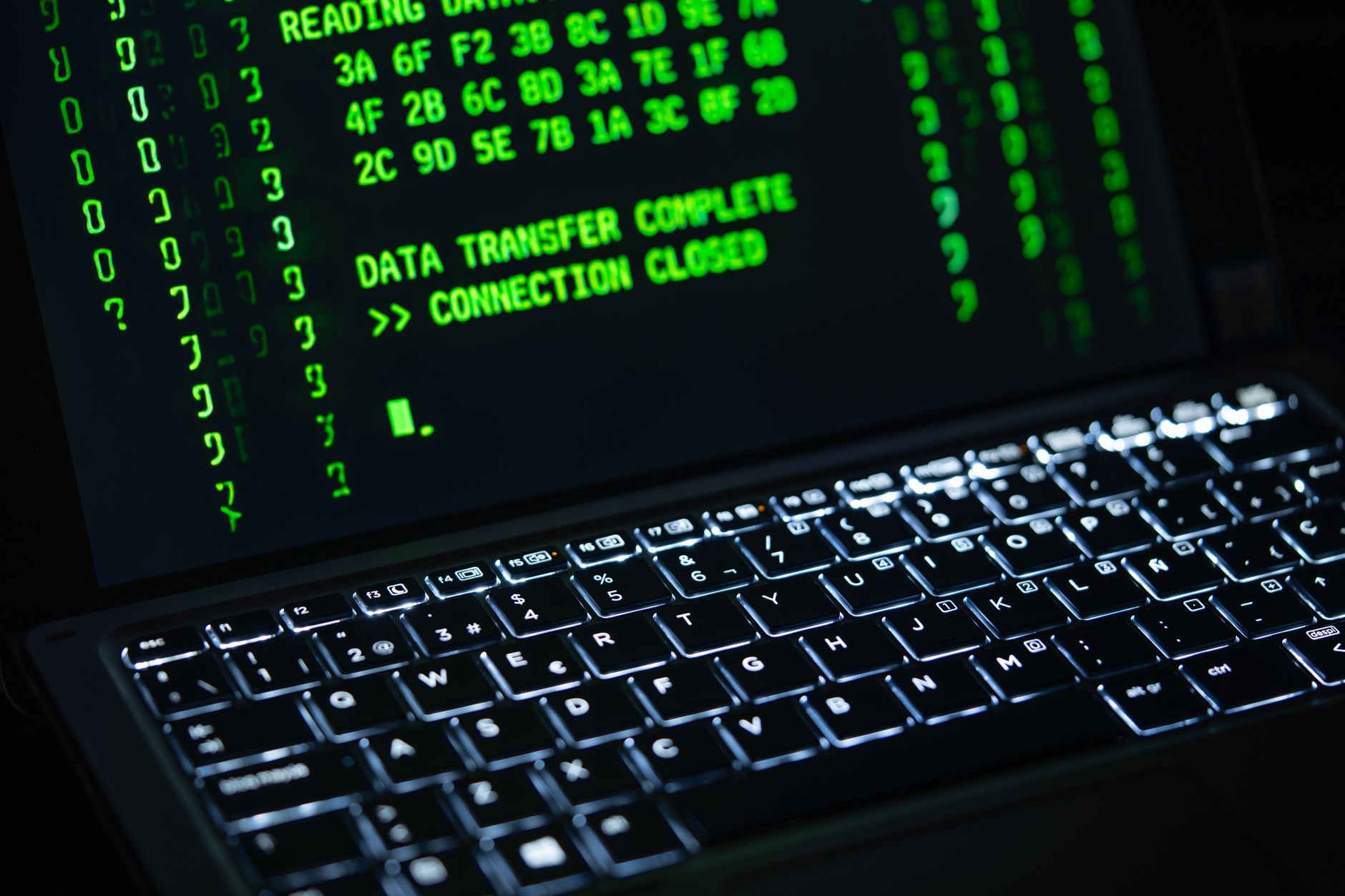 Close-up of a laptop screen displaying green code text. Perfect for cybersecurity themes. (Photo by Rafael Minguet Delgado on Pexels)